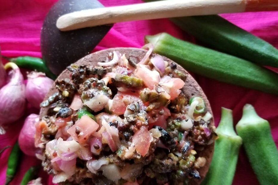 Air-fried okra sambal served in a rustic clay bowl.