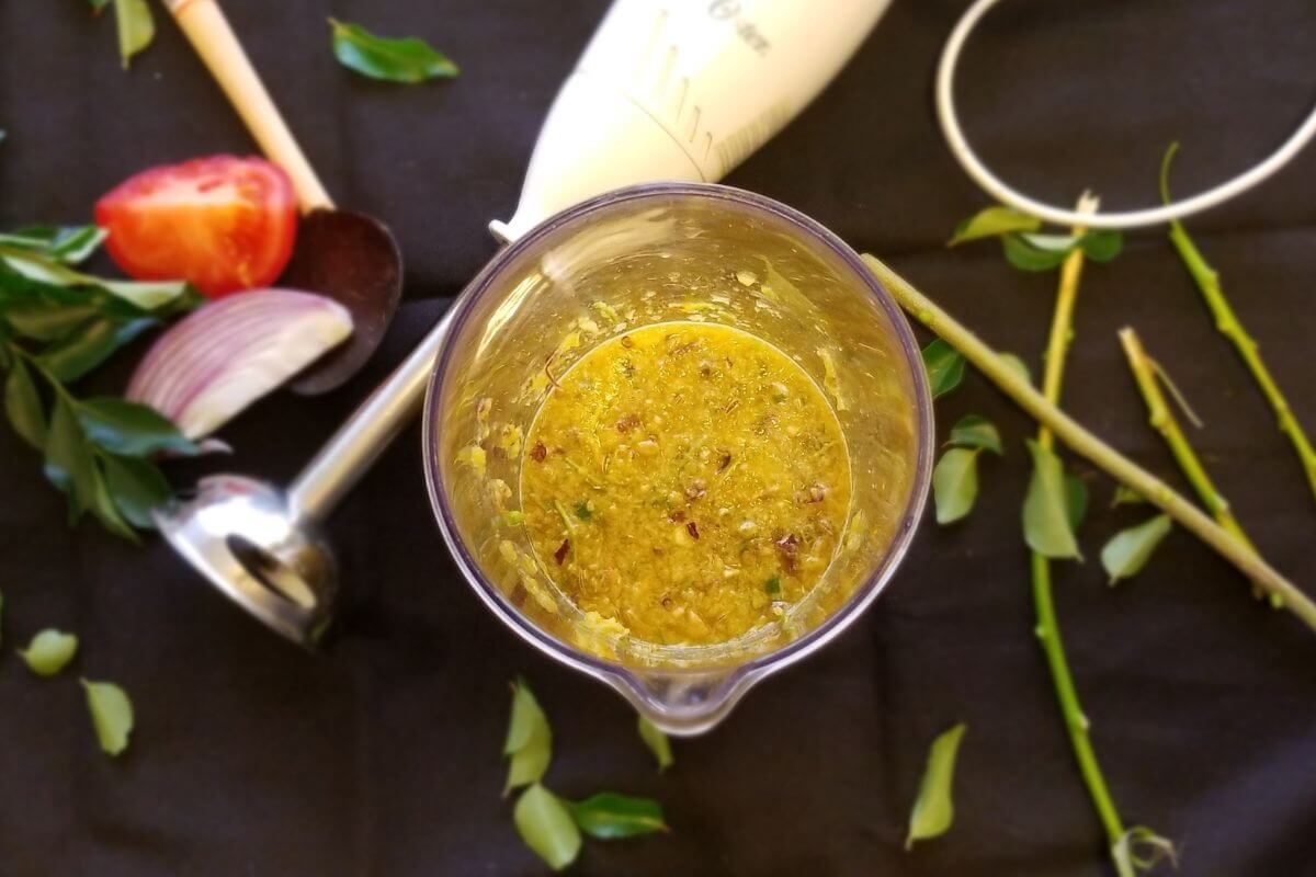 Bowl of rasam served warm and ready to enjoy.