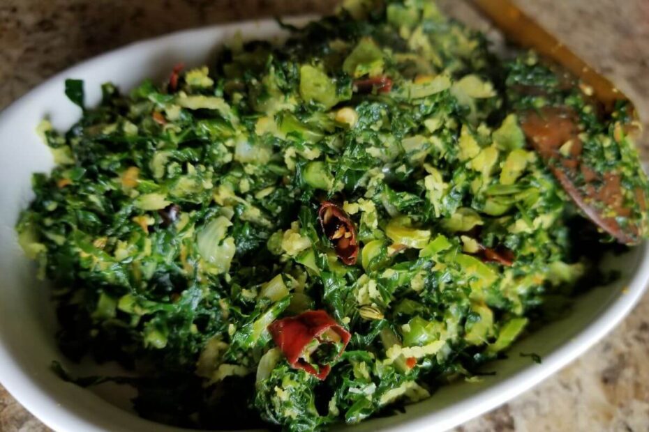 recipe blog post features an image of sri lankan kale stir-fry in a white bowl
