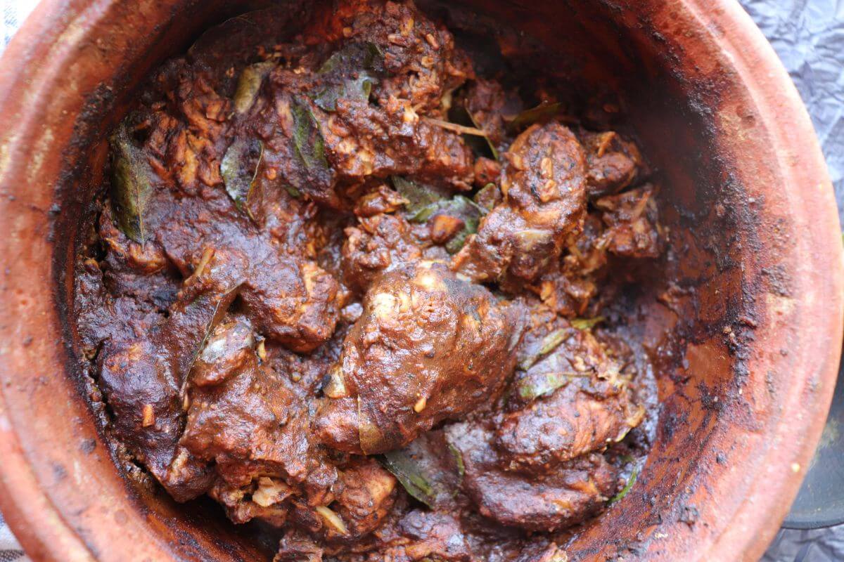 Close-up of Sri Lankan Ambul Thiyal, a dry-style sour fish curry made with goraka