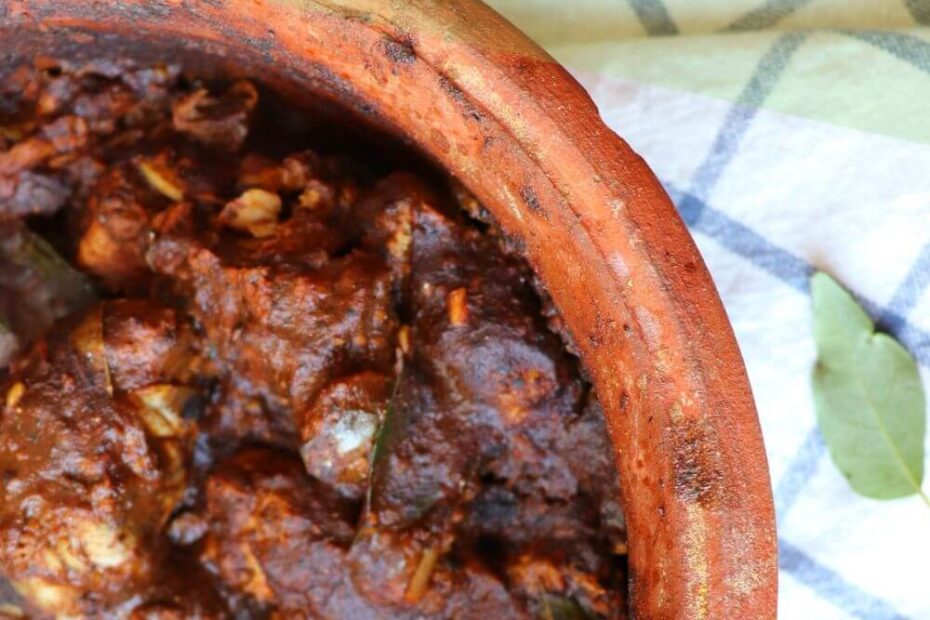 Ambul Thiyal ready and presented in a earthy clay pot ready to be served with rice, showing the rich tangy Sri Lankan fish curry