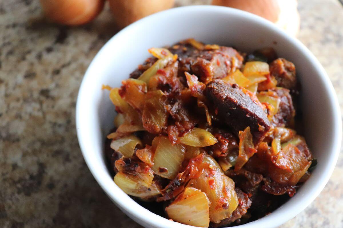 Beef cubes pan‑fried until browned for beef onion sambal.