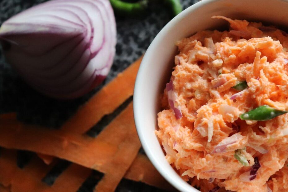 Close‑up of carrot sambal with creamy yogurt and crunchy carrots.