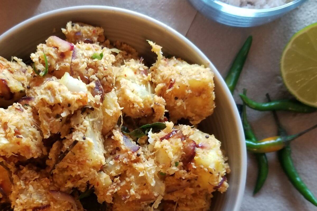 Overhead view of cassava coconut stir‑fry served on a plate.