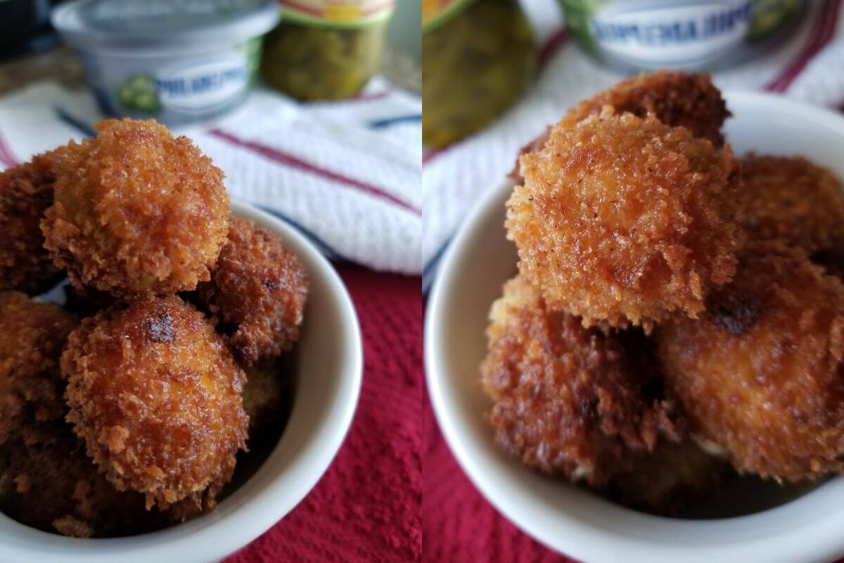 Freshly baked jalapeño poppers in a bowl, topped with melted cheese and crispy crumbs.  