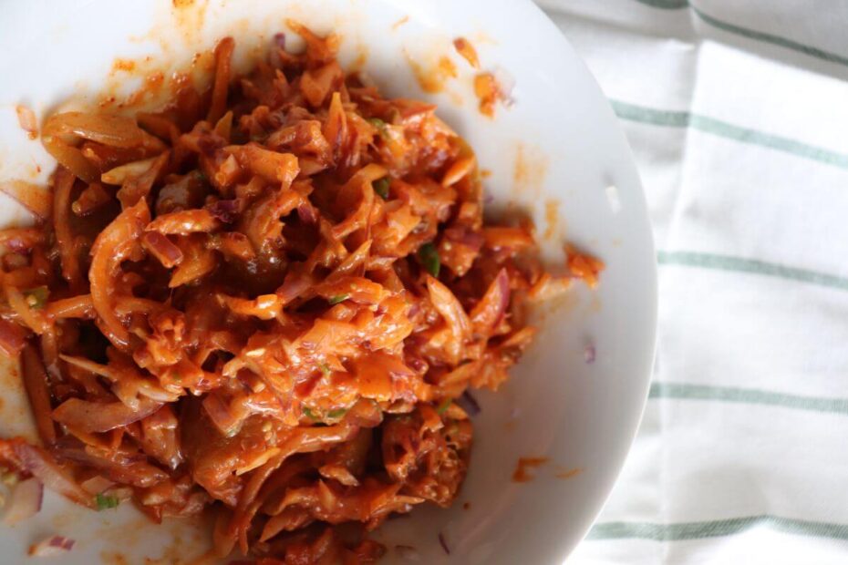 straight shot of spicy lime pickle sambal in a bowl on top of the surface