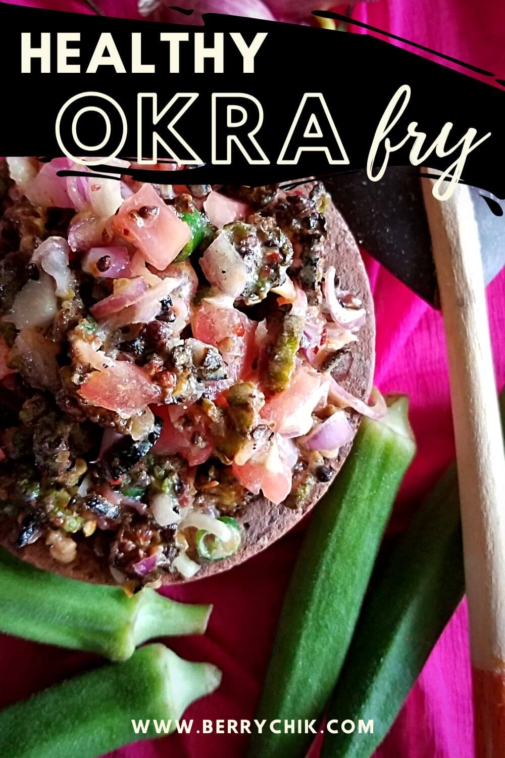 Sri Lankan-style air-fried okra sambal with tomatoes and chilies in a clay bowl.