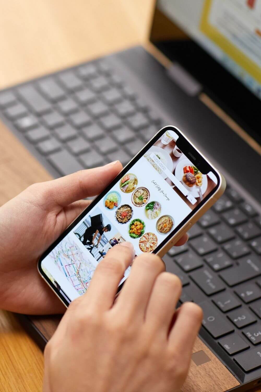 pinterest image featuring a person holding the phone in front of the laptop thinking about FAQ to start a food blog