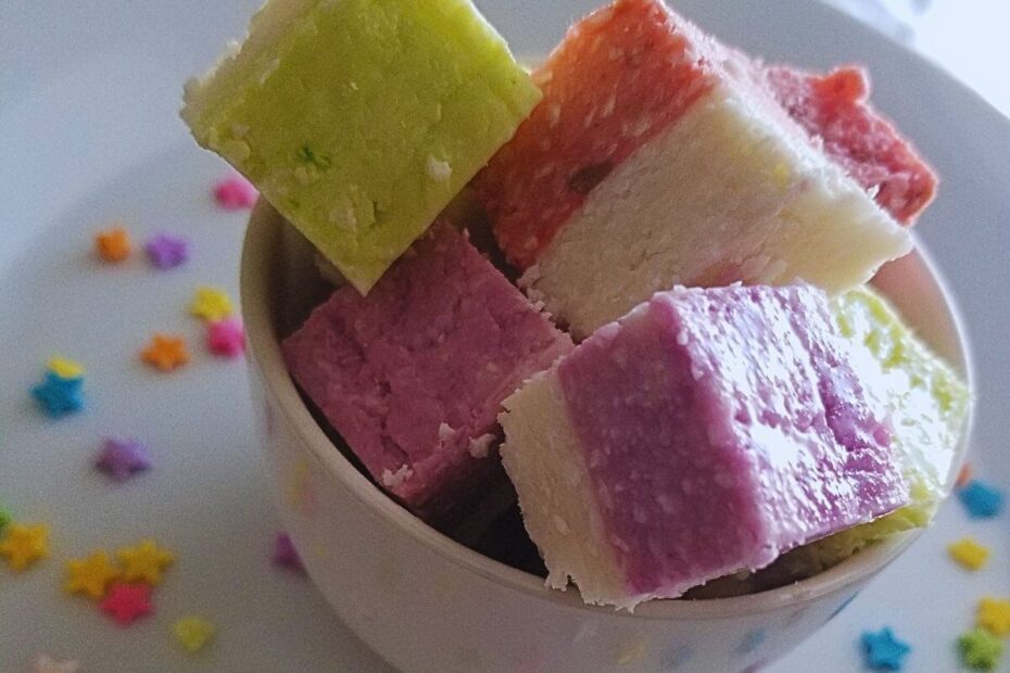coconut ice made into a vegan treat plated on a white bowl