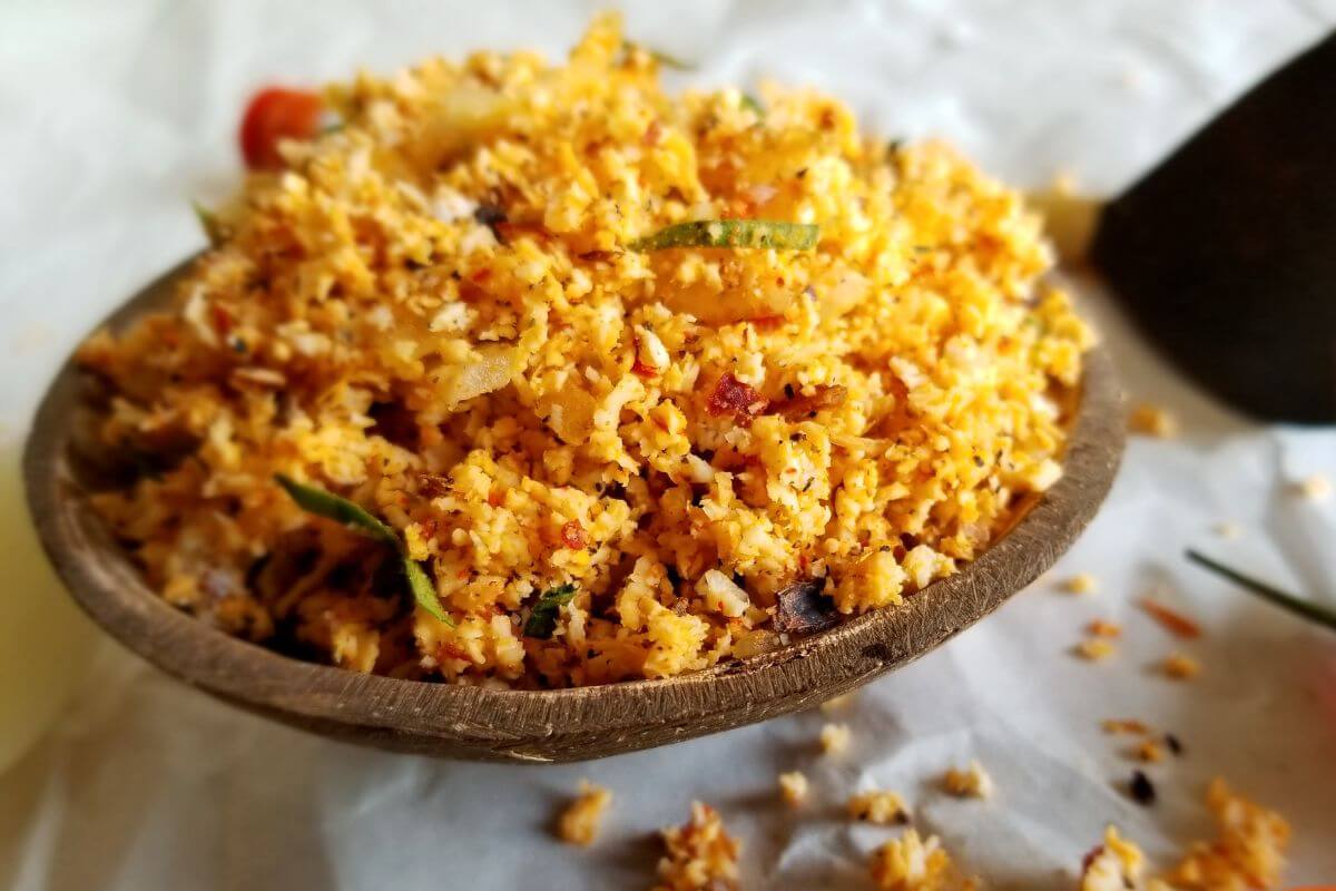 image of coconut sambal in a coconut bowl captured sideway view