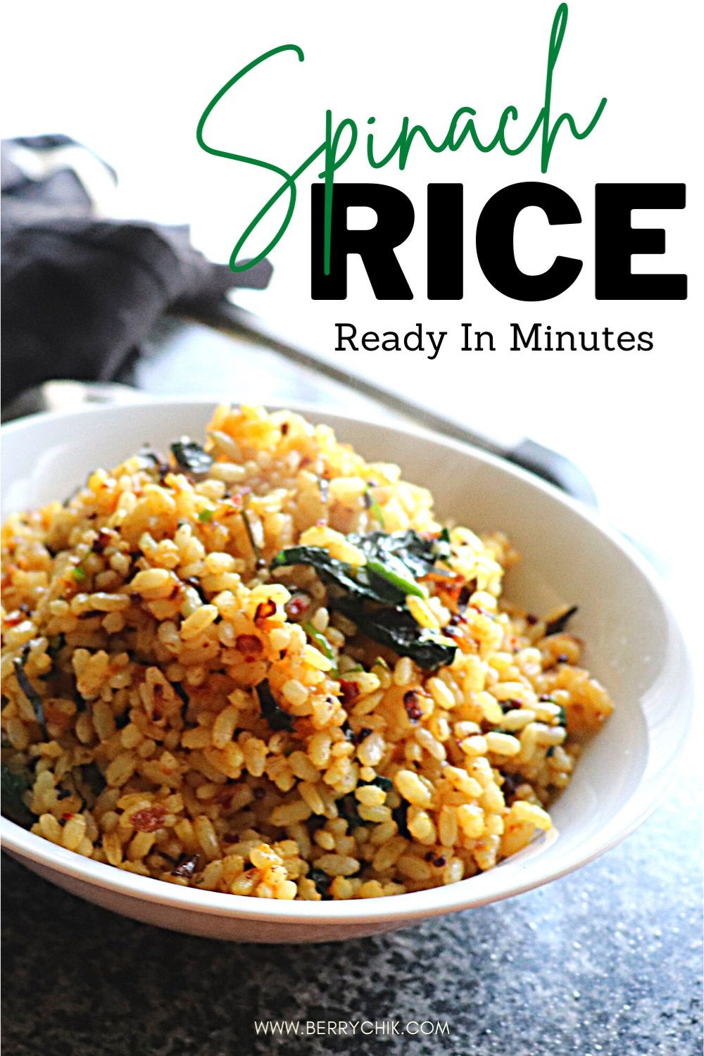pin image featuring spinach rice plated and photographed next to a bright window