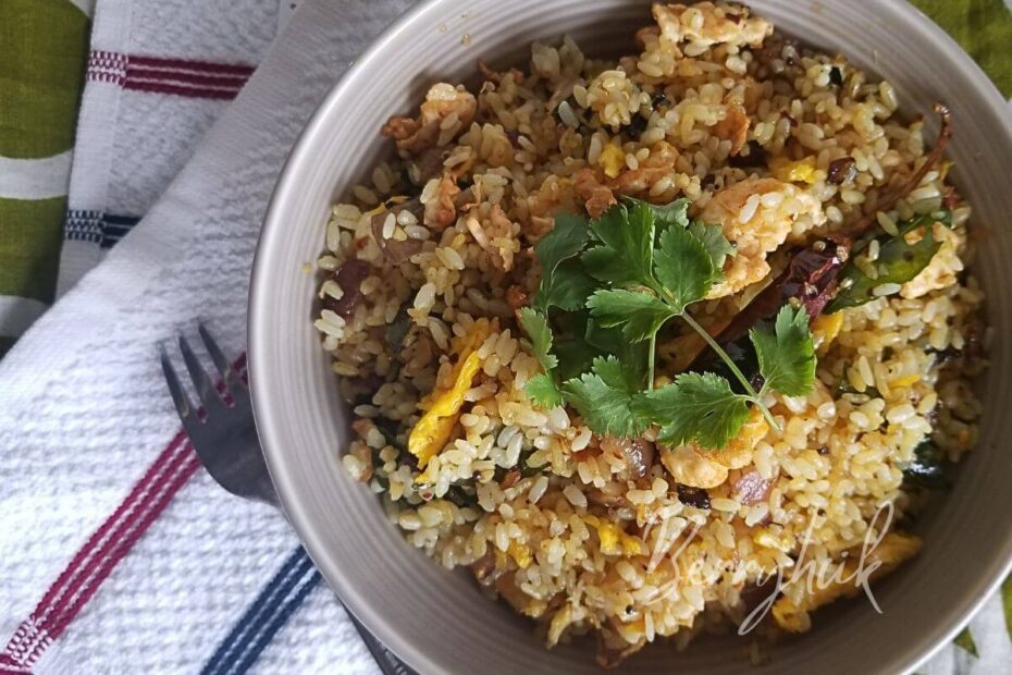 egg rice made with sri lankan spices, plated and garnished ready to enjoy