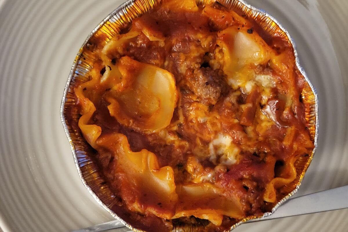 layered beef lasagna taken from the oven seconds ago