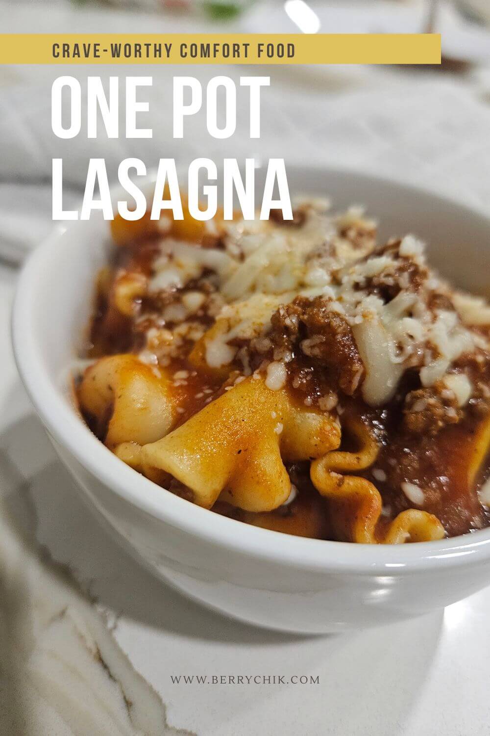 pin image featuring an image of lasagna filled in a bowl with cheese on top
