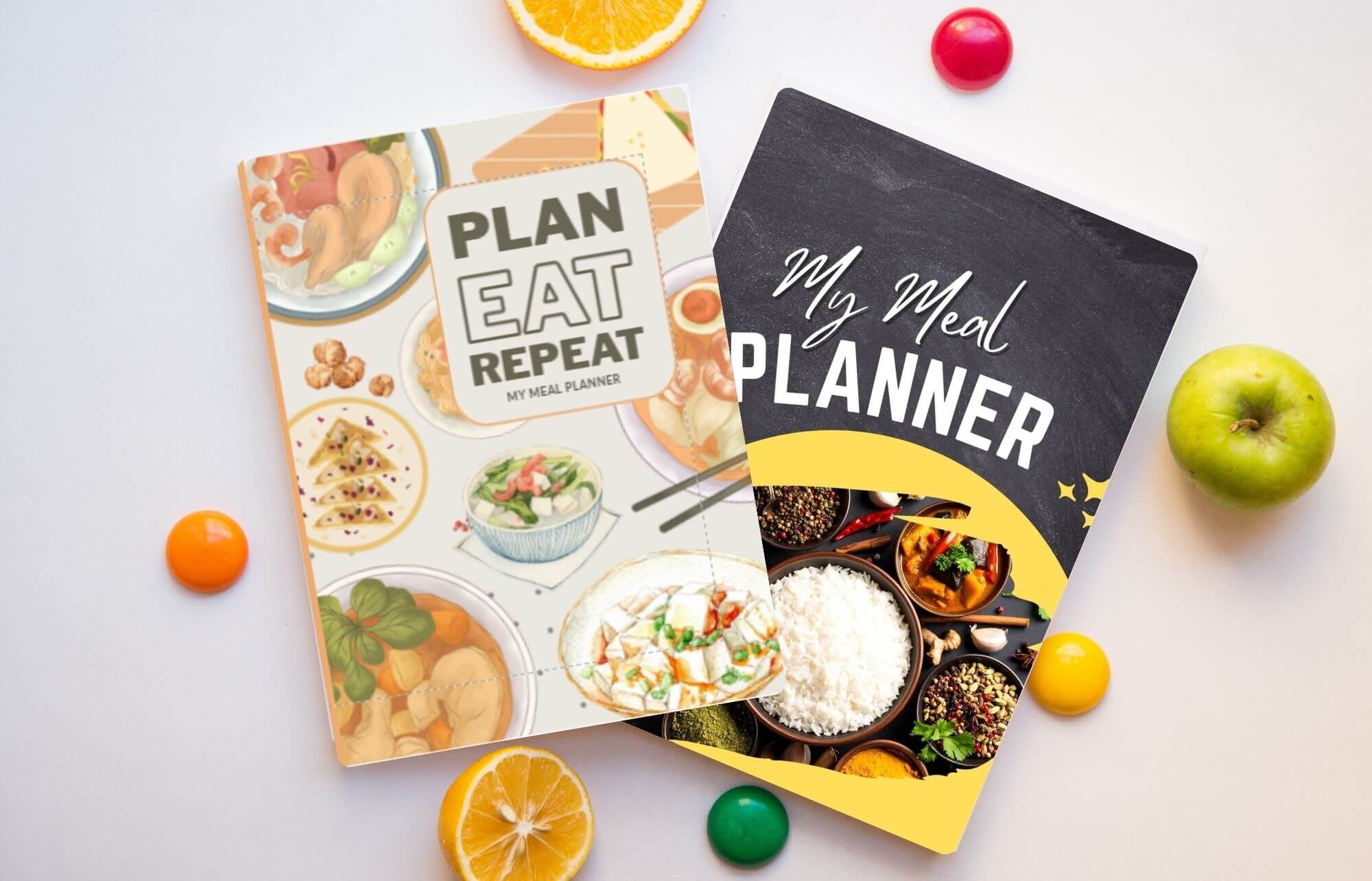 Meal planner paperback books displayed on a kitchen counter, showing Amazon‑available versions.