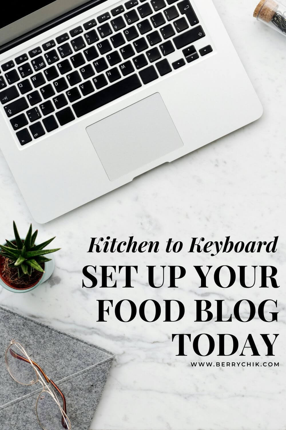 Hands typing on laptop while setting up a new WordPress theme at home