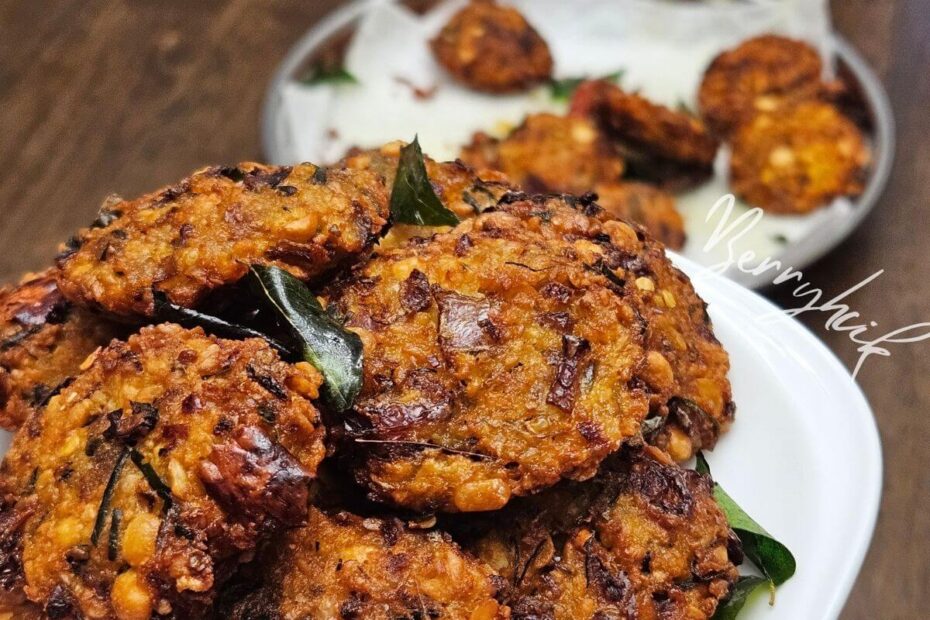 A plate of crispy Sri Lankan parippu vada showing the textured lentil mixture and crunchy edges.