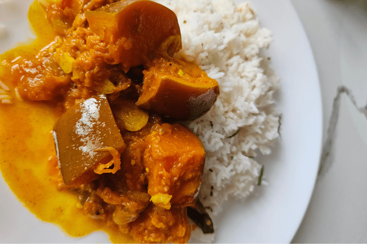 Close-up of Sri Lankan pumpkin curry made with coconut milk and tender pumpkin pieces